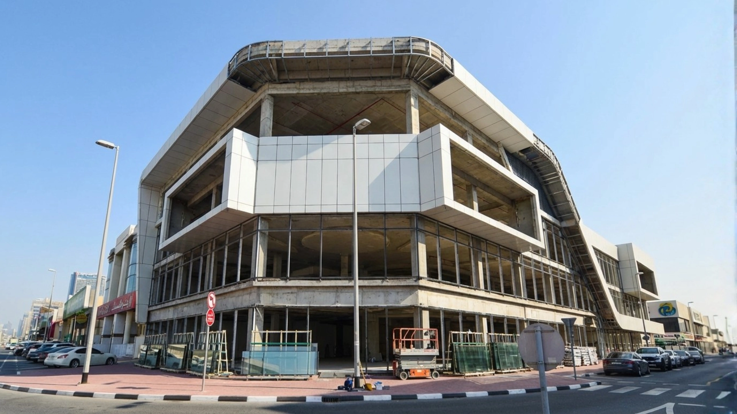Auto showroom aluminium and glass installation under construction by OBA Aluminium & Glass UAE