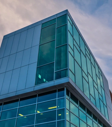 Curtain Wall Systems in Dubai installed on a modern commercial building with an aluminium and glass façade
